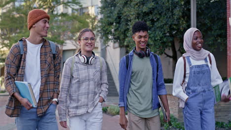 diverse group of students walking on university campus