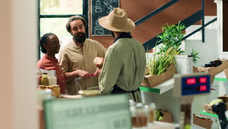 farmer offers fresh veggies samples