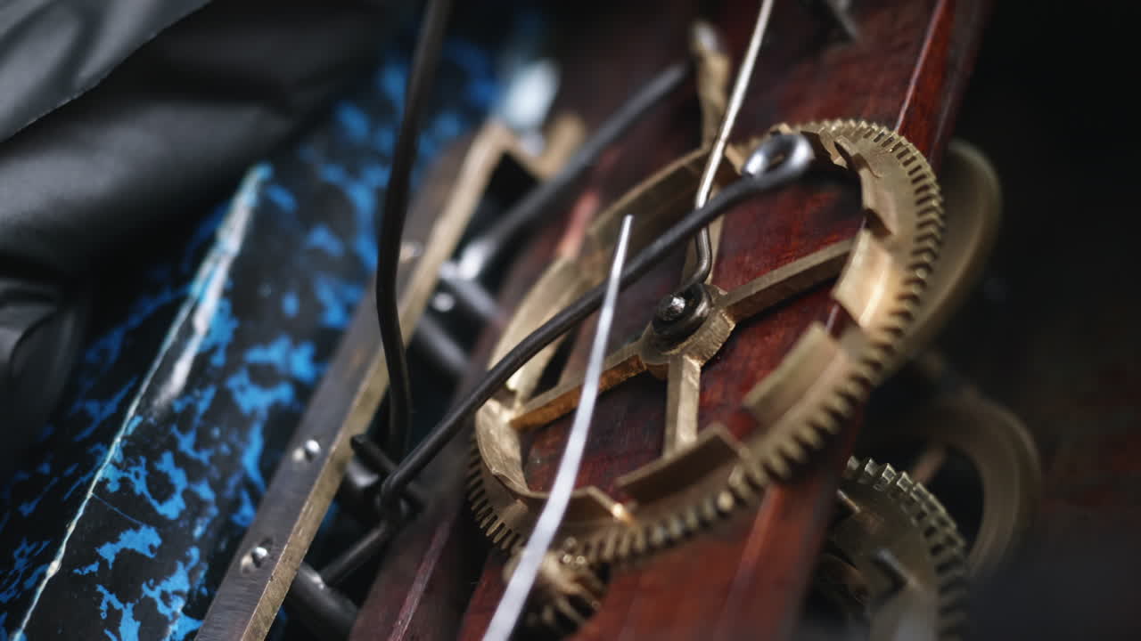 Close up of a brass clockwork from an antique cuckoo clock