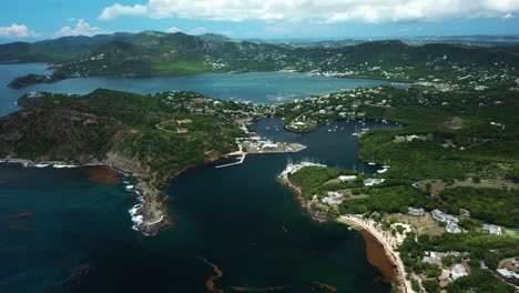 aerial view of a caribbean bay with harbor and mountains