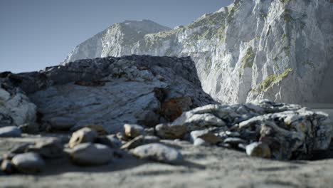 sand beach among rocks at atlantic ocean coast in portugal