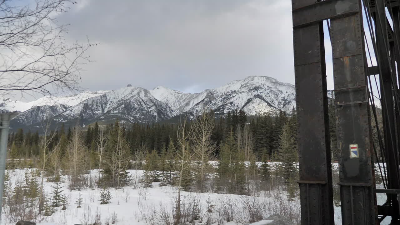 Cinematic Push In of Mountain Range in Winter.