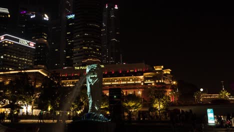 a hyper lapse video of merlion fountain in singapore at night