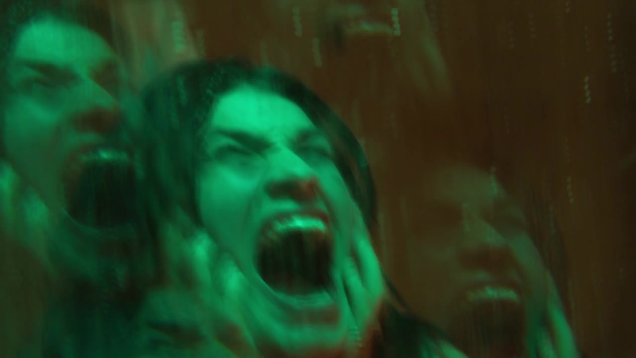 Mad Woman Shouting in front of Wet Mirror
