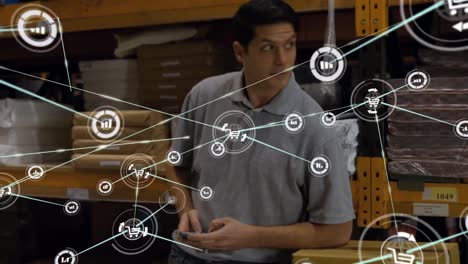 Animation-of-network-of-connections-and-icons-over-warehouse-worker
