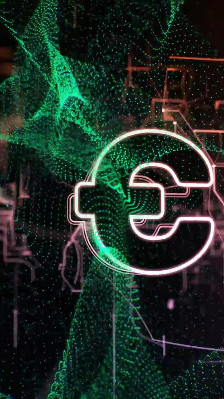 Vertical video: Green particles drifting in, forming neon euro E, wrapping and highlighting symbol