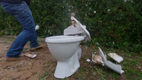 slomo hammer wrecked toilet with inscription stop covid-19 sars-cov-2 coronavirus desease quarantine pandemic lockdown