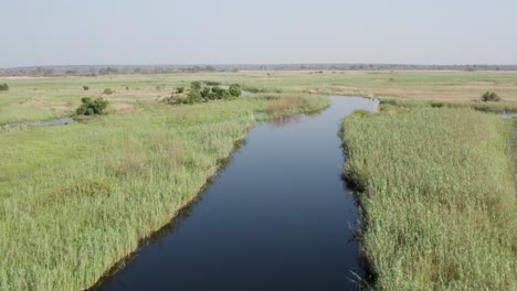 Aerial-View-Of-Cuando-River-Through-Lush-Green-Landscape-Of-Caprivi-Strip-In-Namibia