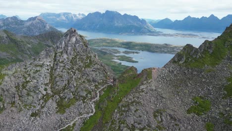 djevelporten hike viewpoint at floya mountain in svolvaer, lofoten islands, norway - aerial 4k