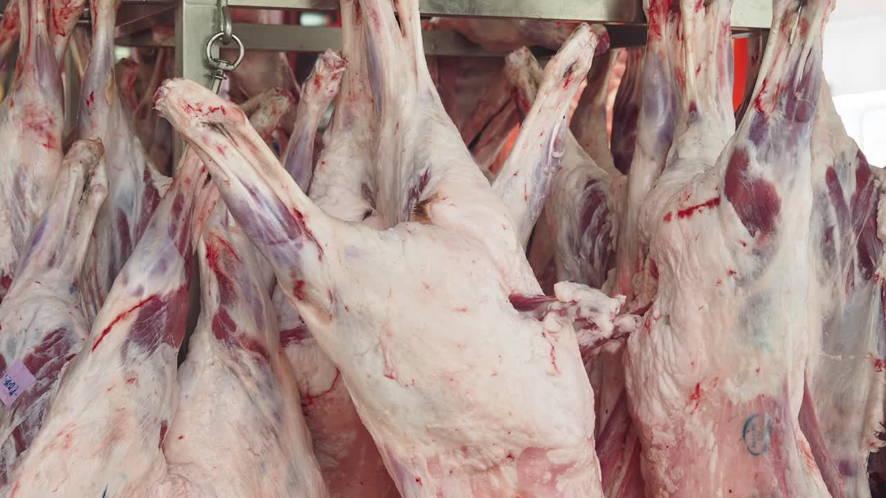 Hanging animal carcasses in a meat market