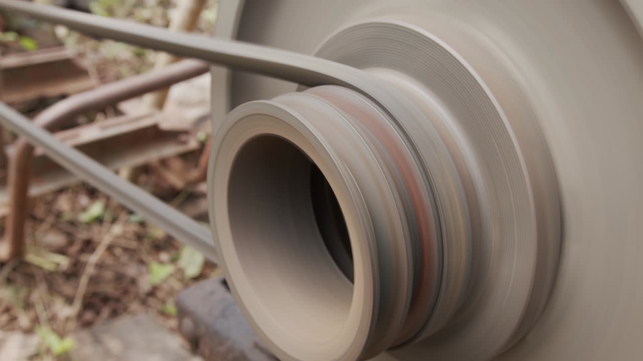 Close up, Belt rotation on the tractor engine.