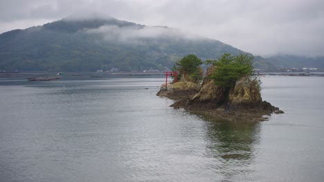 etajima bay, mist covers mountains with navy road shrine, hiroshima prefecture