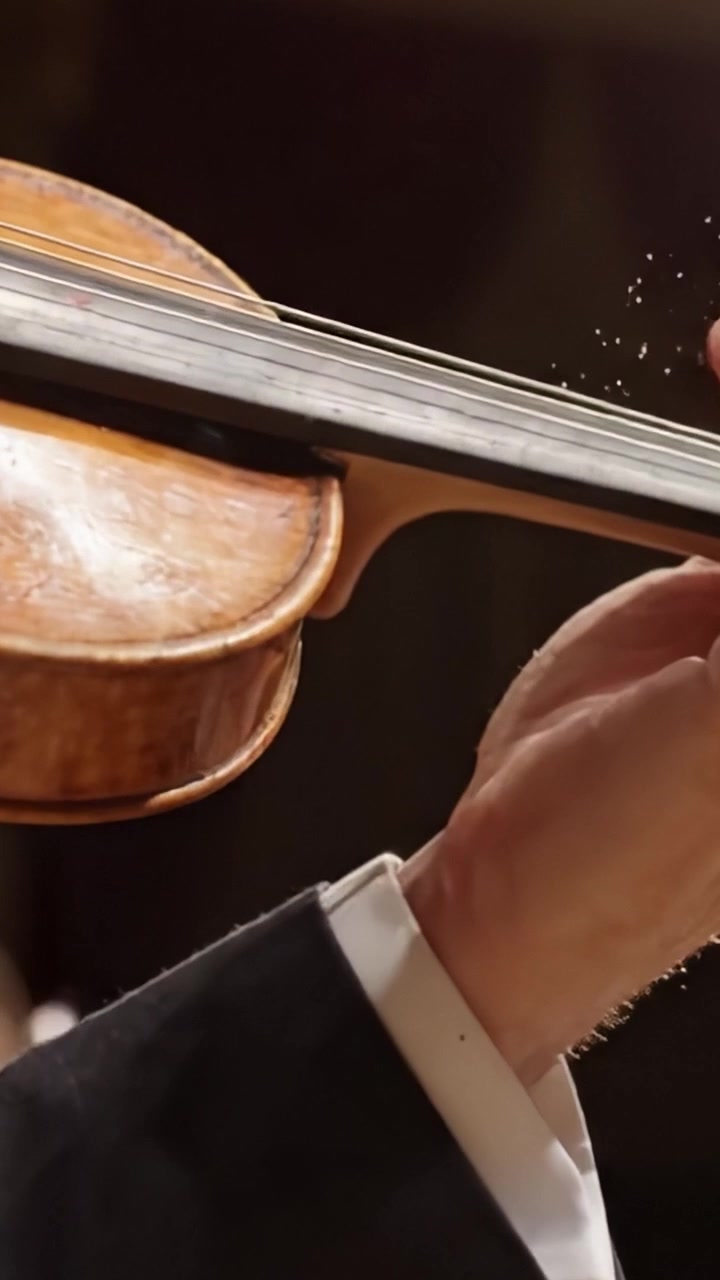 An Intimate Look at the Art of Violin Playing: Capturing the Skillful Use of Fingers and Bow Technique in a Beautiful Performance