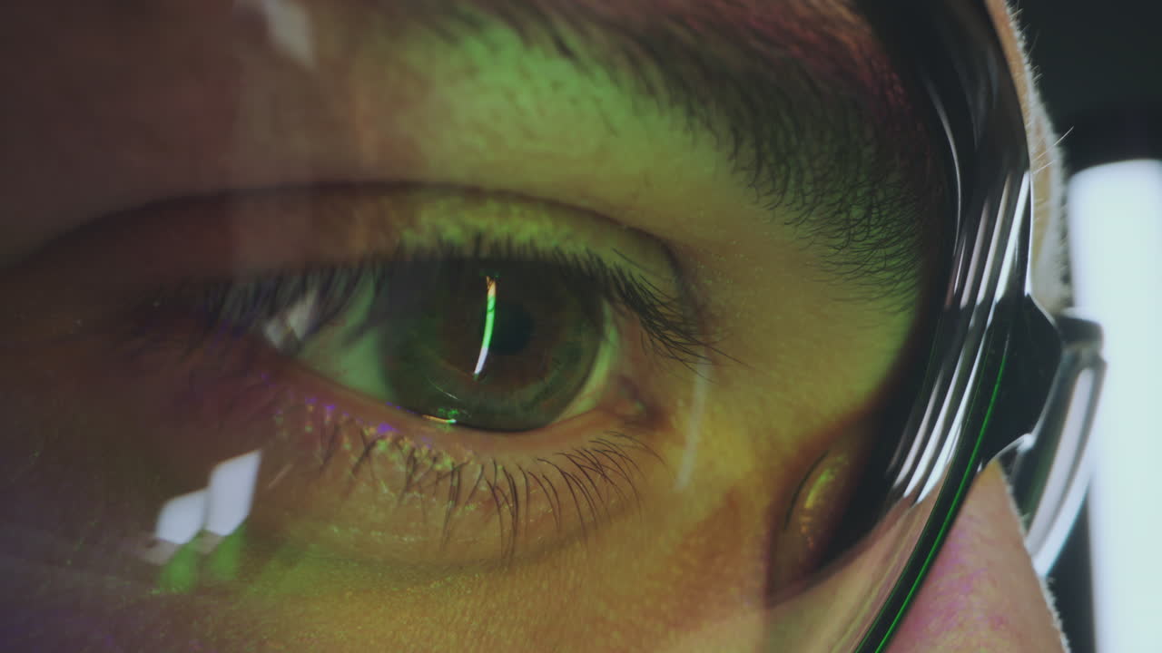 Close-up of a Person's Eye Wearing Safety Goggles