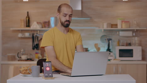 man working from smart house with automation lighting system