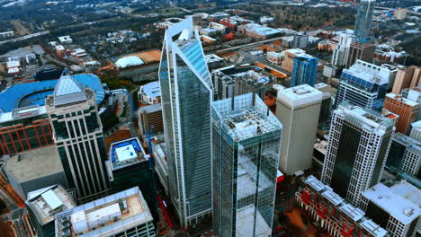 beautiful mirror facades of skyscrapers in the uptown of dallas, texas, usa. sunny scenery of the city from drone