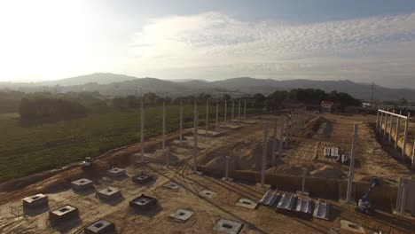 maquinaria de construcción que trabaja en la vista aérea del sitio de construcción