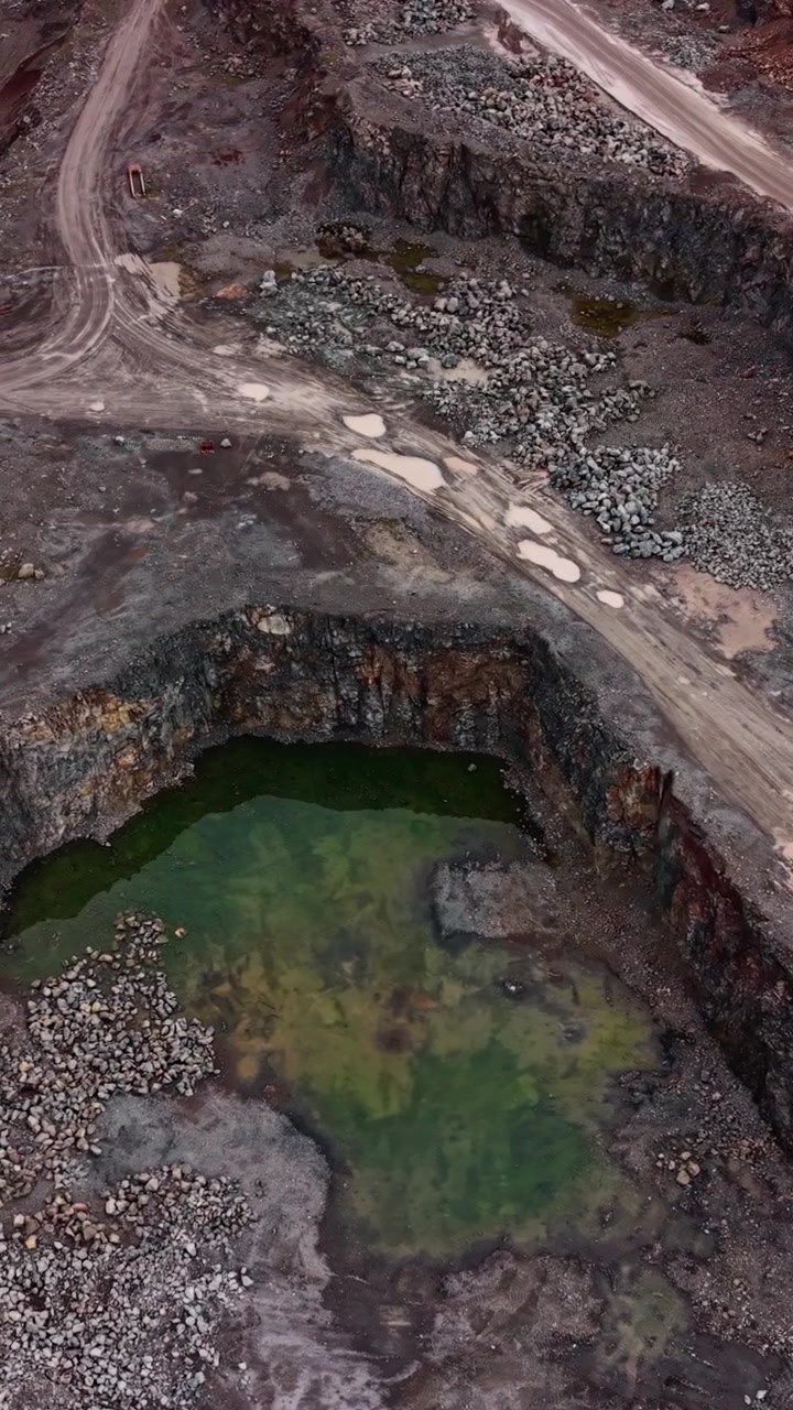 Aerial View of an Industrial Stone Quarry with Water Ponds