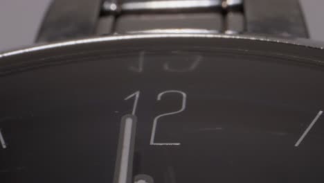 seconds hand moving in hand watch closeup view