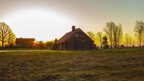 beautiful orange sunrise over some country houses