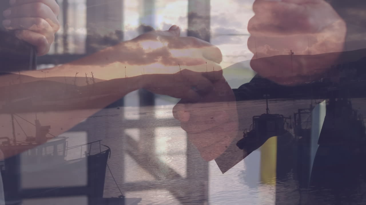 Animation of caucasian businesspeople shaking hands over cityscape