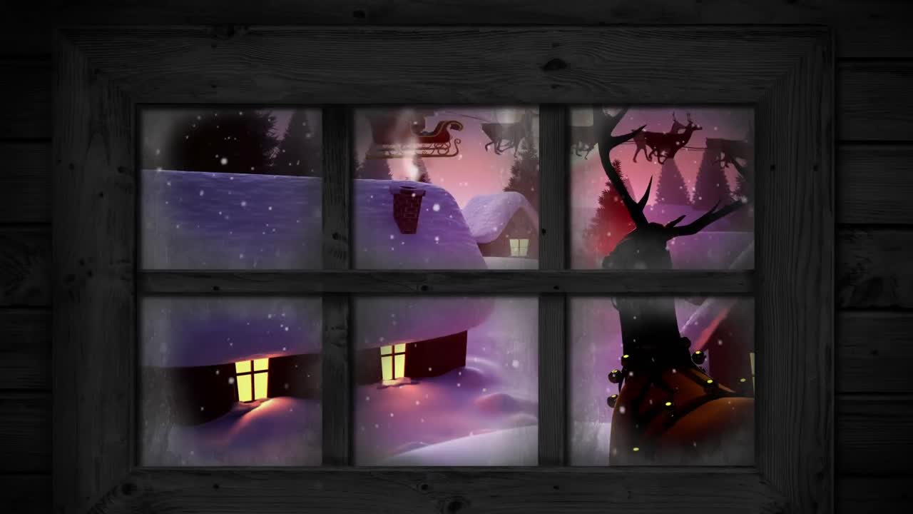 Wooden window frame against snow falling over multiple houses and trees on winter landscape