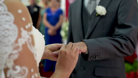 important moment that the bride and groom join their rings during the wedding ceremony