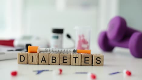diabetes concept with insulin syringe and health items