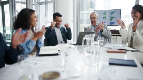 a team of business people celebrating a successful meeting with a handshake