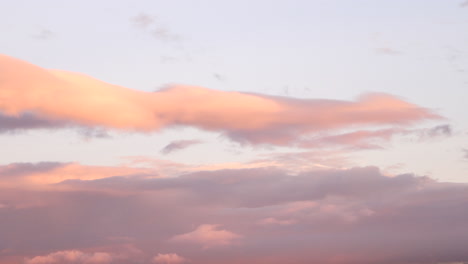 contrast of dark clouds over sunset sky