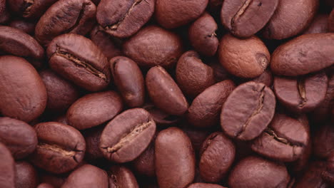 coffee beans moving inside a grinder - close up shot