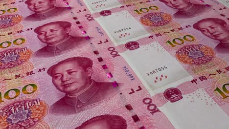 100 chinese renminbi printing. loop footage, 3d illustration. currency of china.