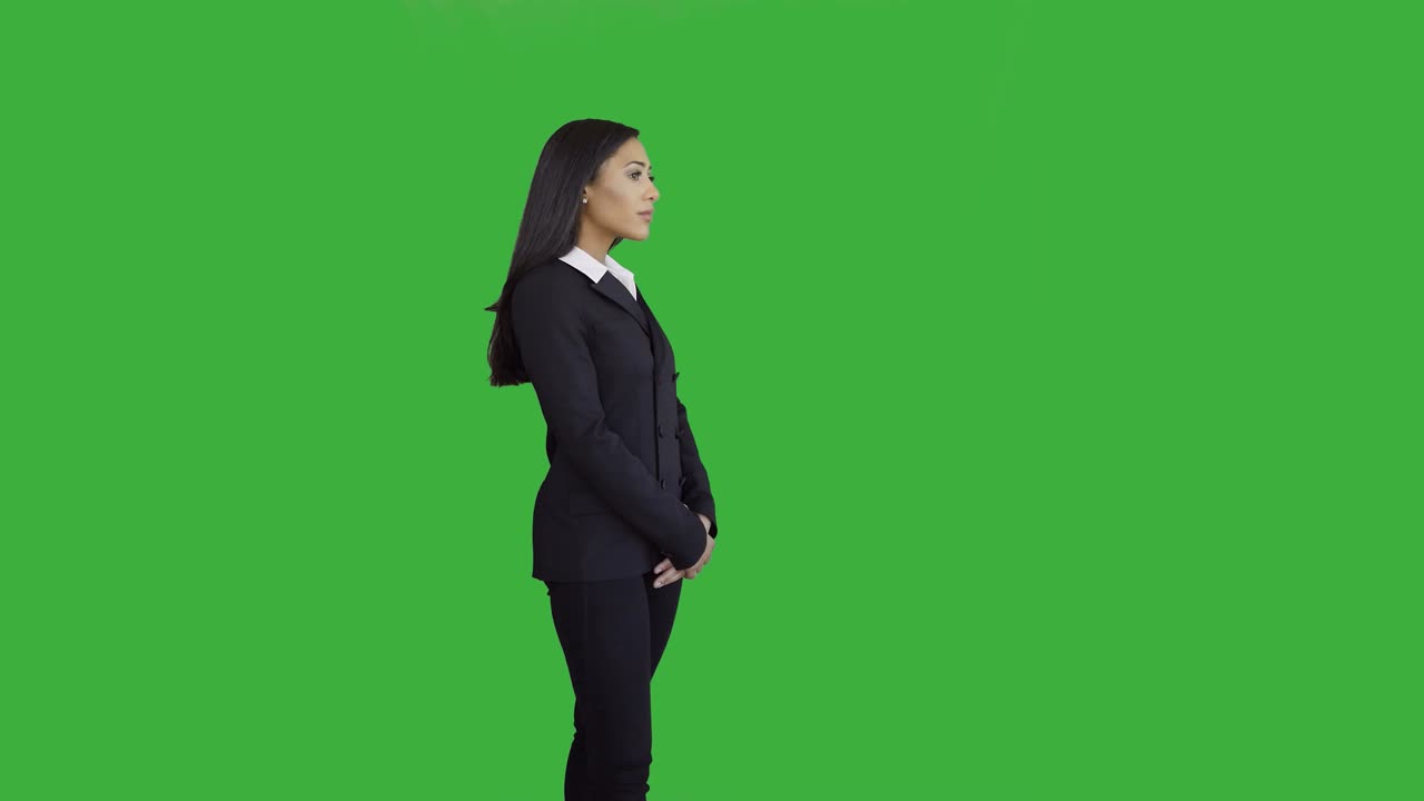 Lifestyle Portrait of Young African American Business Woman Isolated on Green Screen Chroma key Background