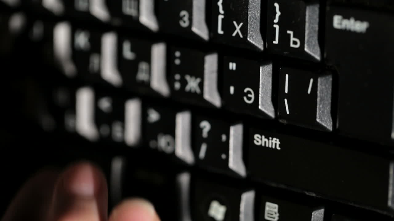 Woman is typing on the keyboard