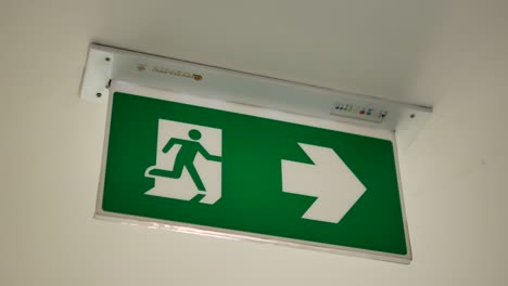 Close-Up-Footage-of-Fire-Exit-Signboard
