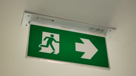 Close Up Footage of Fire Exit Signboard