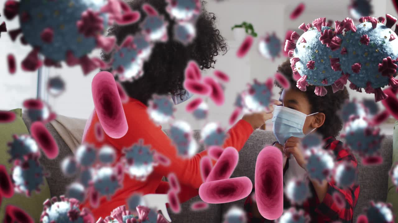 Animation of virus cells over african american mother with son wearing face masks