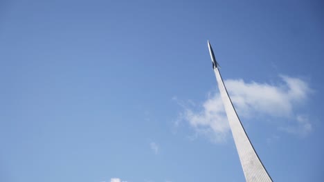 monument to cosmonauts against a clear blue sky