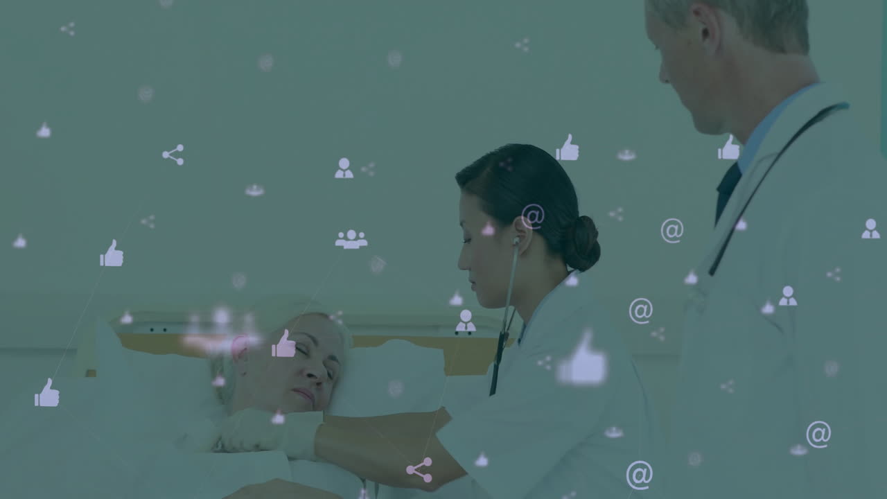 Medical professionals using animation with social media icons in hospital setting