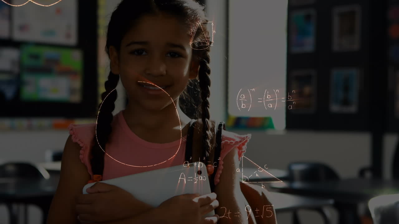 Animation of mathematical equations over smiling schoolgirl holding tablet in classroom
