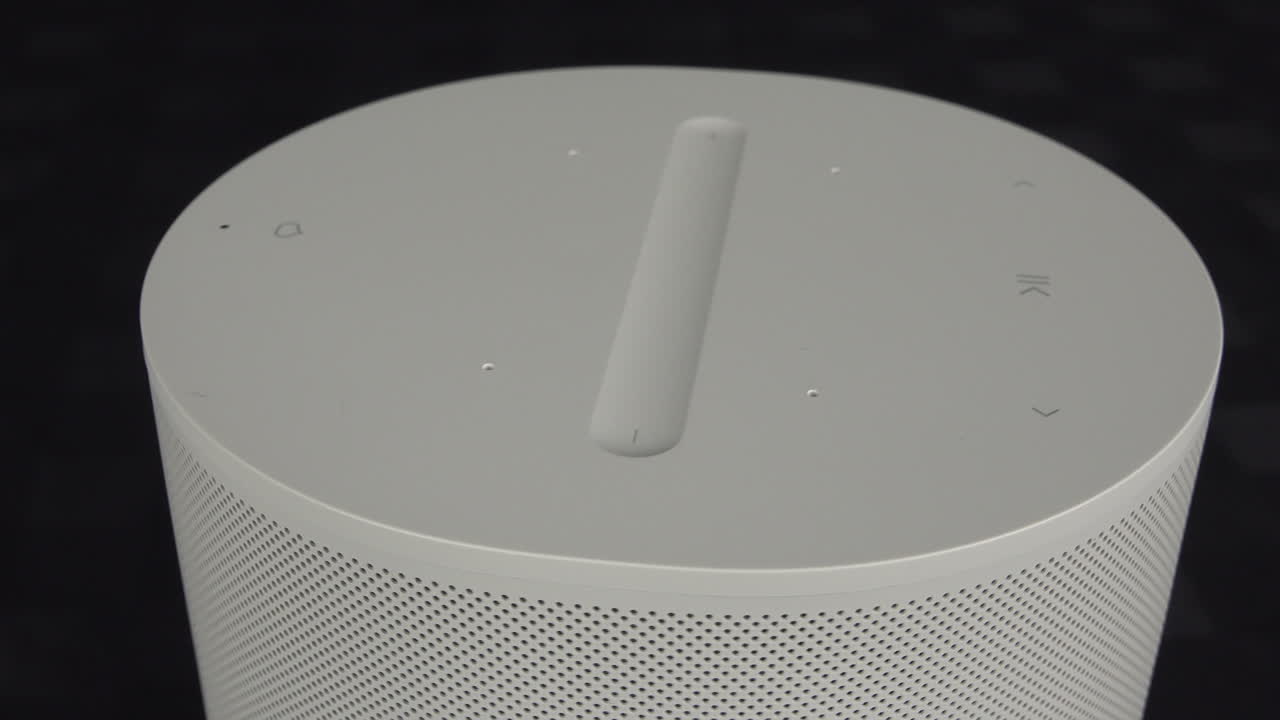 Close up view of the Sonos Era 100 on a rotating table