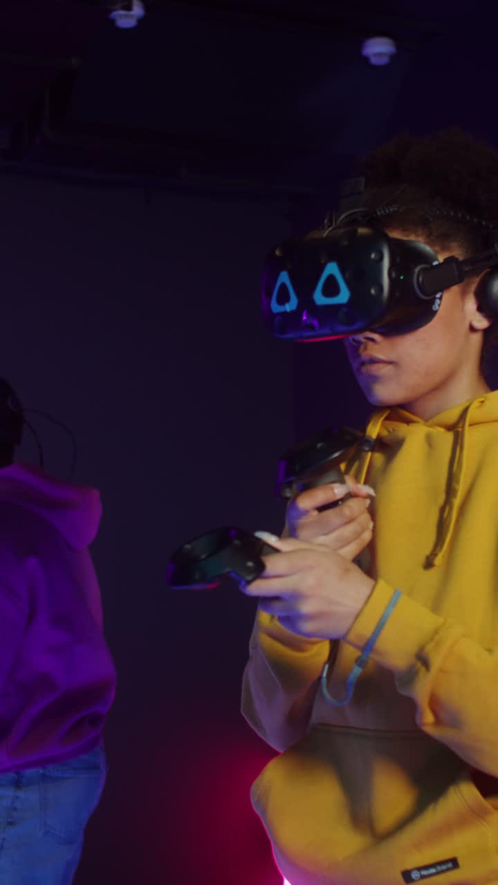 People using virtual reality headsets for gaming