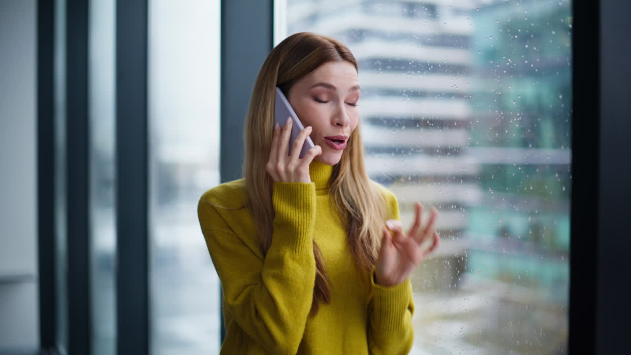 Cheerful blonde talking smartphone sharing news closeup. Smiling woman talking