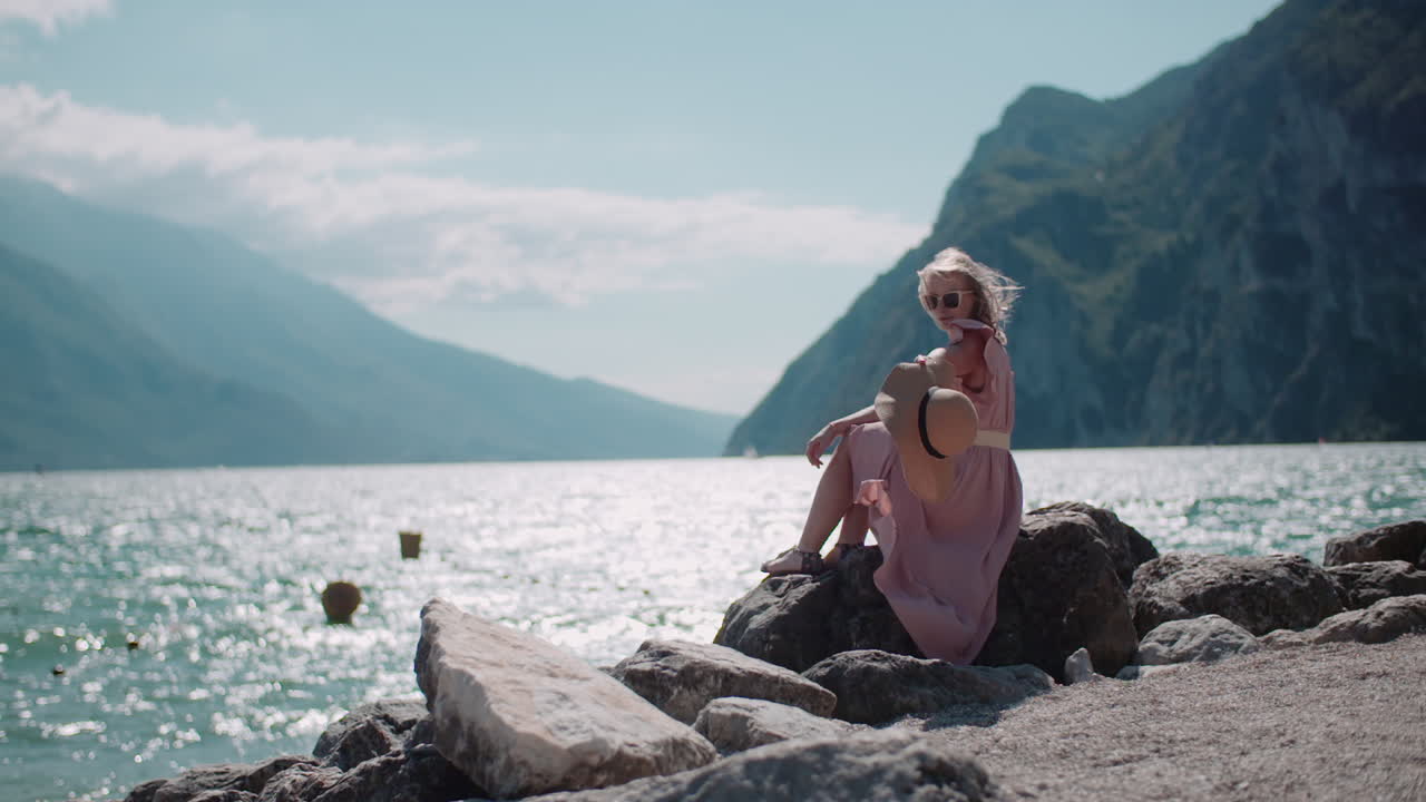 Happy Woman on Scenic Seashore with Hat