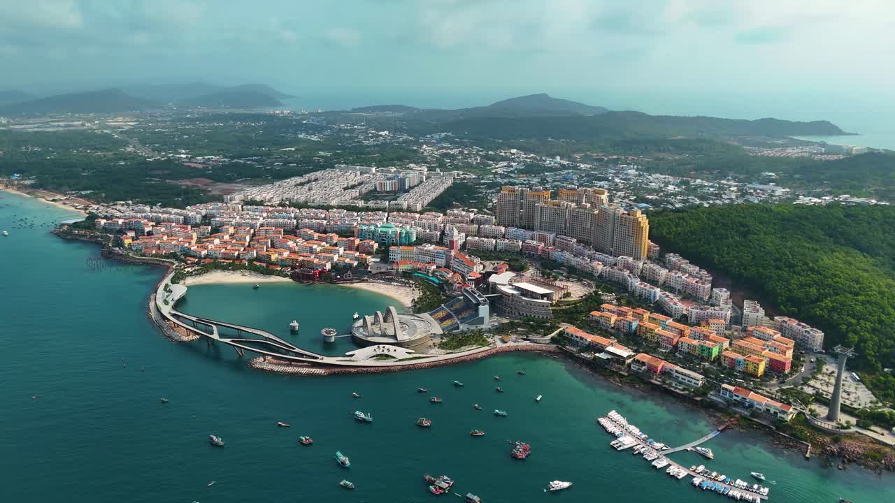 High altitude aerial view of Phu Quoc's Sunset Town, Vietnam. Faux Italian architecture, vibrant colors, and modern cityscape.