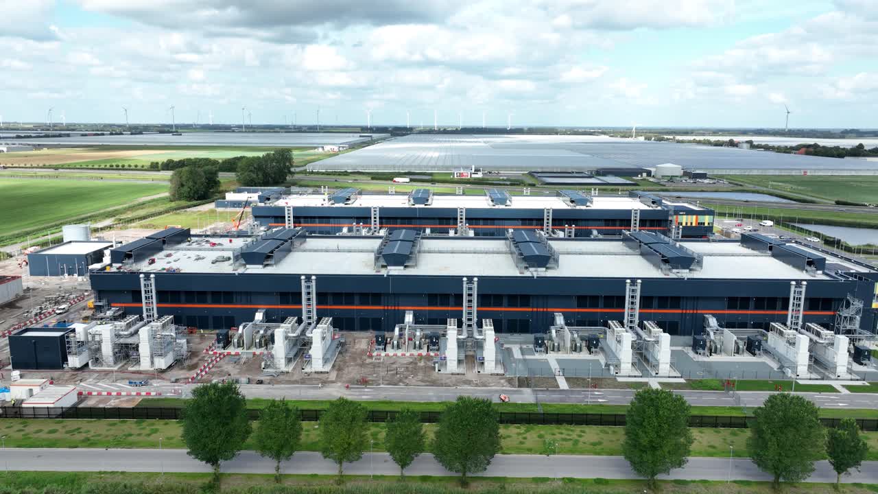 Computer center, data center, internet technology, big data and information technology, computer industry in The Netherlands, aerial drone video.