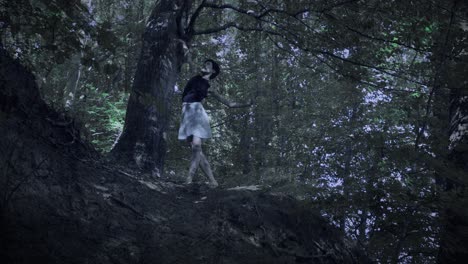 dancer moves to the rhythm of the forest in the darl