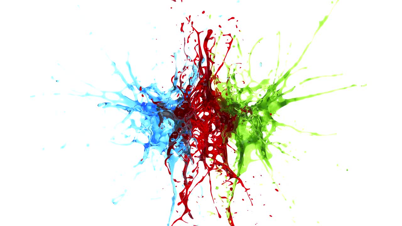 explosión de tres gotas de líquido azul, rojo y verde. movimiento lento. alfa