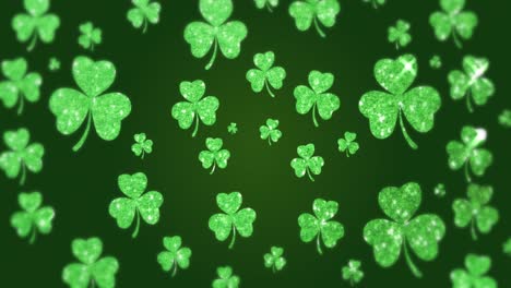 Animation-of--shimmering-green-shamrocks-falling