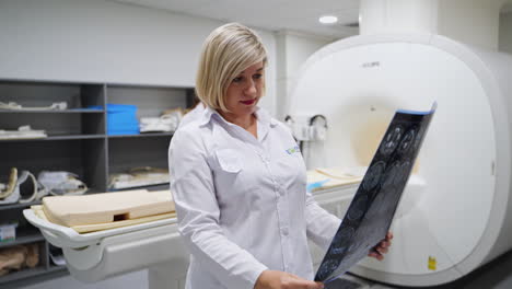 doctor reviewing mri scan in hospital